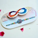 Vibrant Multicolour Crystal Rakhi – RK-215 | Designer Octagon Enamel Rakhi - Image 2