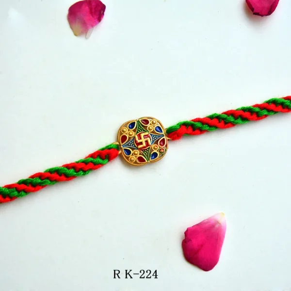 Swastik Traditional Rakhi – RK-224 | Handcrafted Rakhi with Red-Green Braided Thread - Image 1