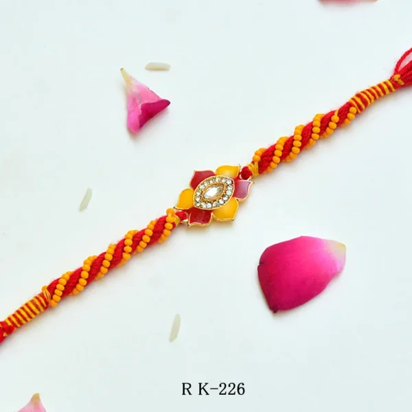 Sunlit Bloom Rakhi – RK-226 | Floral Rakhi with Yellow-Red Thread Work & Crystal Centerpiece - Image 1