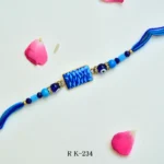 Textured Blue Evil Eye Rakhi – RK-234 | Designer Rectangle Bead with Beaded Thread
