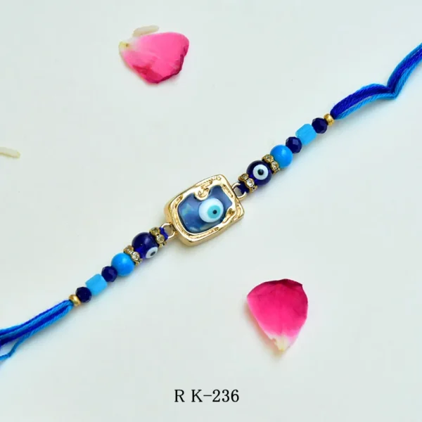 Blue Evil Eye Rakhi – RK-236 | Protective Glass Bead Rakhi with Luxe Golden Frame & Blue Thread - Image 1