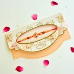 Elegant Red Floral Rakhi – RK-237 | Intricate Mandala Design with Golden Beads & Red Thread - Image 2