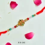 Multicolor Star Rakhi – RK-242 | Festive Rakhi with Colorful Enamel Design & Golden Beads