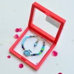Trendy Bracelet Rakhi for Bhai with Multicolor Beads & Tree Charm - Image 2
