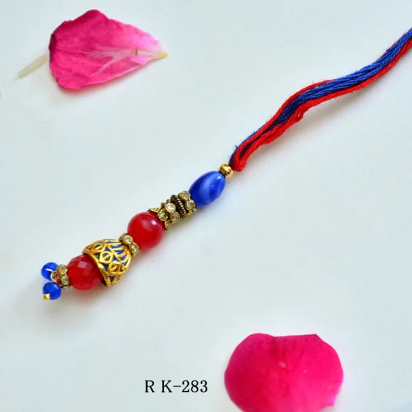 Graceful Blue & Red Lumba Rakhi with Jhumka Charm for Bhabhi -RK-283 - Image 1
