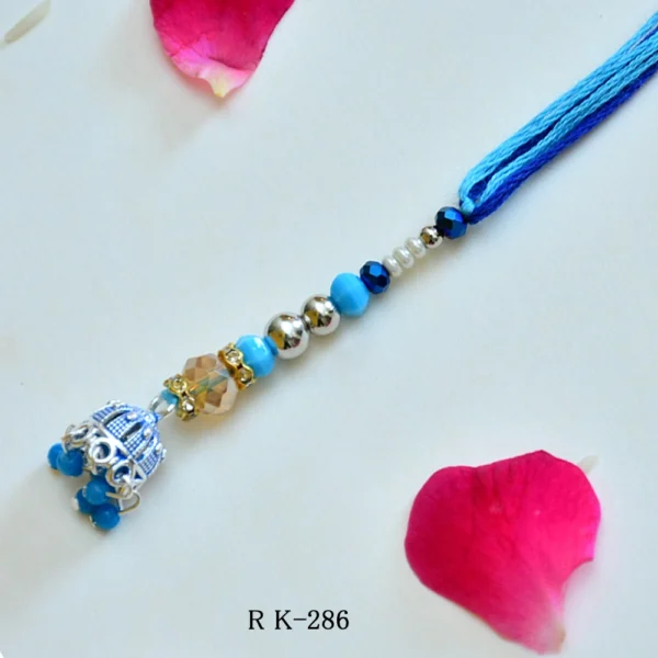Elegant Blue Crystal Lumba Rakhi with Pearl Beads for Bhabhi - RK-286 - Image 1