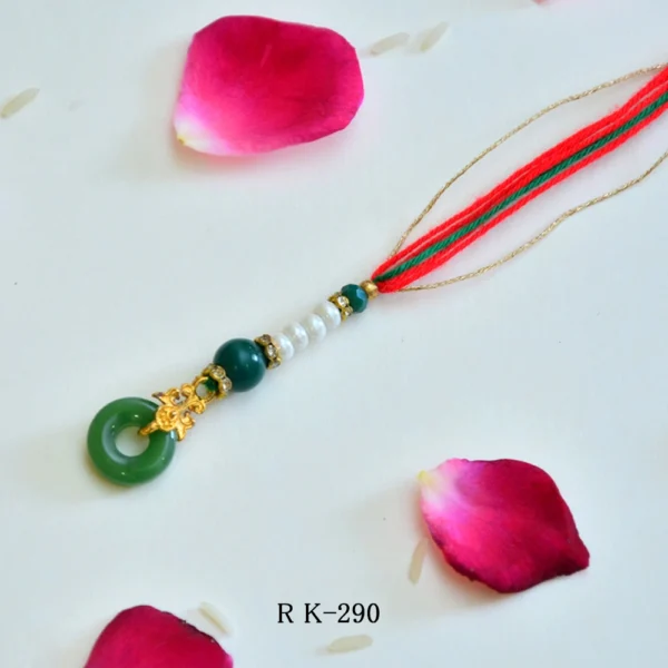 Jade-Inspired Lumba Rakhi - RK-290 | Elegant Green Thread Rakhi with Pearls & Gold Accents - Image 1