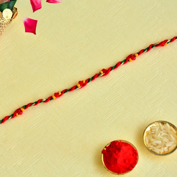 Handcrafted Braided Thread Rakhi – RK-140 | Simple Elegance in Tricolor Thread
