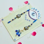 Blue Mosaic Evil Eye Bhaiya-Bhabhi Rakhi Set – RK-263 | Elegant Beads & Stonework - Image 2