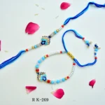 Blue Lotus Charm Bhaiya-Bhabhi Rakhi Set – RK-269 | Elegant Beads & Pearl Detailing